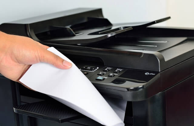 Close up multifunction printer (Focus on button)